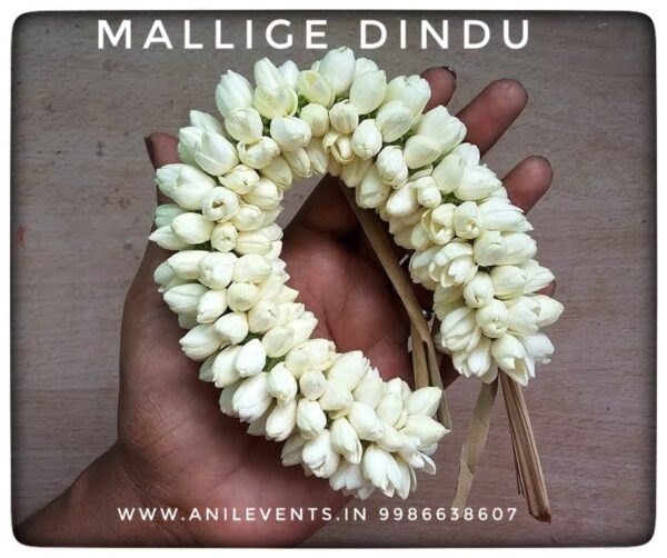 Gajra is a flower garland that is worn by South Asian women during festive occasions, weddings, or as part of everyday traditional attire. They are made usually of varies types of jasmine flowers but rose, crossandra and barleria are also widely used in gajras.