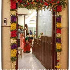 "We can decorate your home/Office with strands of flowers- orange or yellow marigolds which can be strung everywhere in your home, (such as doors, gates, and steps), flower arch, flower bunches, and various forms of seasonal blooms are well-decorated for house-warming" Sannai Melam | Nadaswaram in Bangalore for Wedding, Marriage