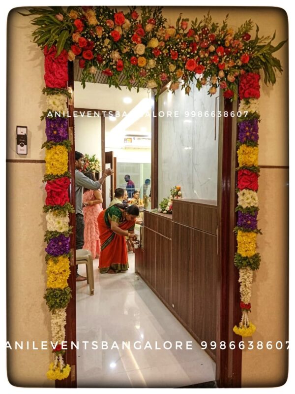 "We can decorate your home/Office with strands of flowers- orange or yellow marigolds which can be strung everywhere in your home, (such as doors, gates, and steps), flower arch, flower bunches, and various forms of seasonal blooms are well-decorated for house-warming" Sannai Melam | Nadaswaram in Bangalore for Wedding, Marriage