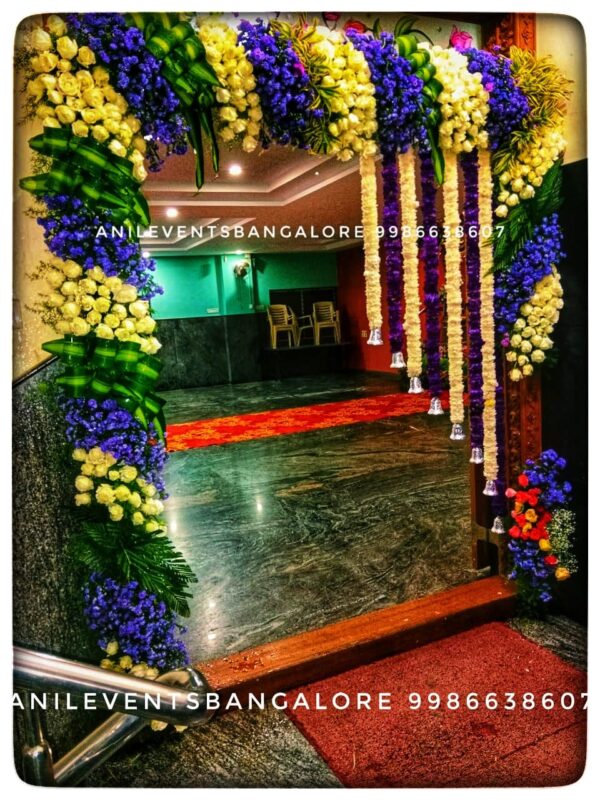 Express love and respect for the divine using flowers. Its significant part of the ritual. They are considered a manifestation of devotional emotion. Shop for the best flower door decorations from our collection of exclusive, customized & handmade Flower garlands for your Main door and Pooja room for any kind of occasions. By Anil Events Bangalore Shamanthige flower / Chrysanthemum and Marigold flowers are most popular and beautiful flowers of all time used to decorate homes. They come in a wide range of colours and varieties, so there is sure to be a type that will fit perfectly into any space