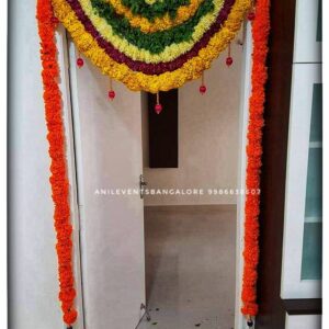 Express love and respect for the divine using flowers. Its significant part of the ritual. They are considered a manifestation of devotional emotion. Shop for the best flower door decorations from our collection of exclusive, customized & handmade Flower garlands for your Main door and Pooja room for any kind of occasions. By Anil Events Bangalore Shamanthige flower / Chrysanthemum and Marigold flowers are most popular and beautiful flowers of all time used to decorate homes. They come in a wide range of colours and varieties, so there is sure to be a type that will fit perfectly into any space